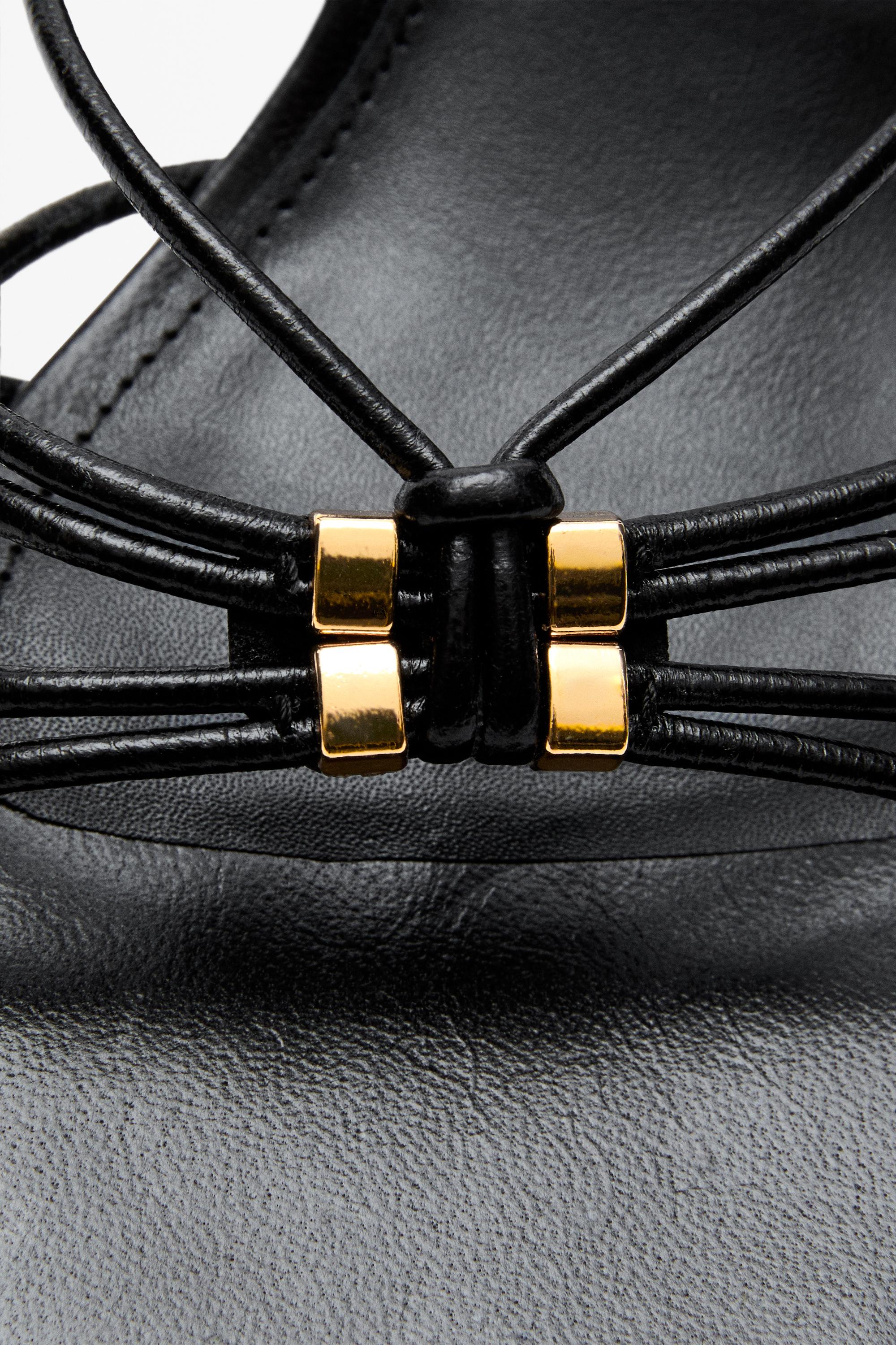 Strappy heeled sandals with embellished detail